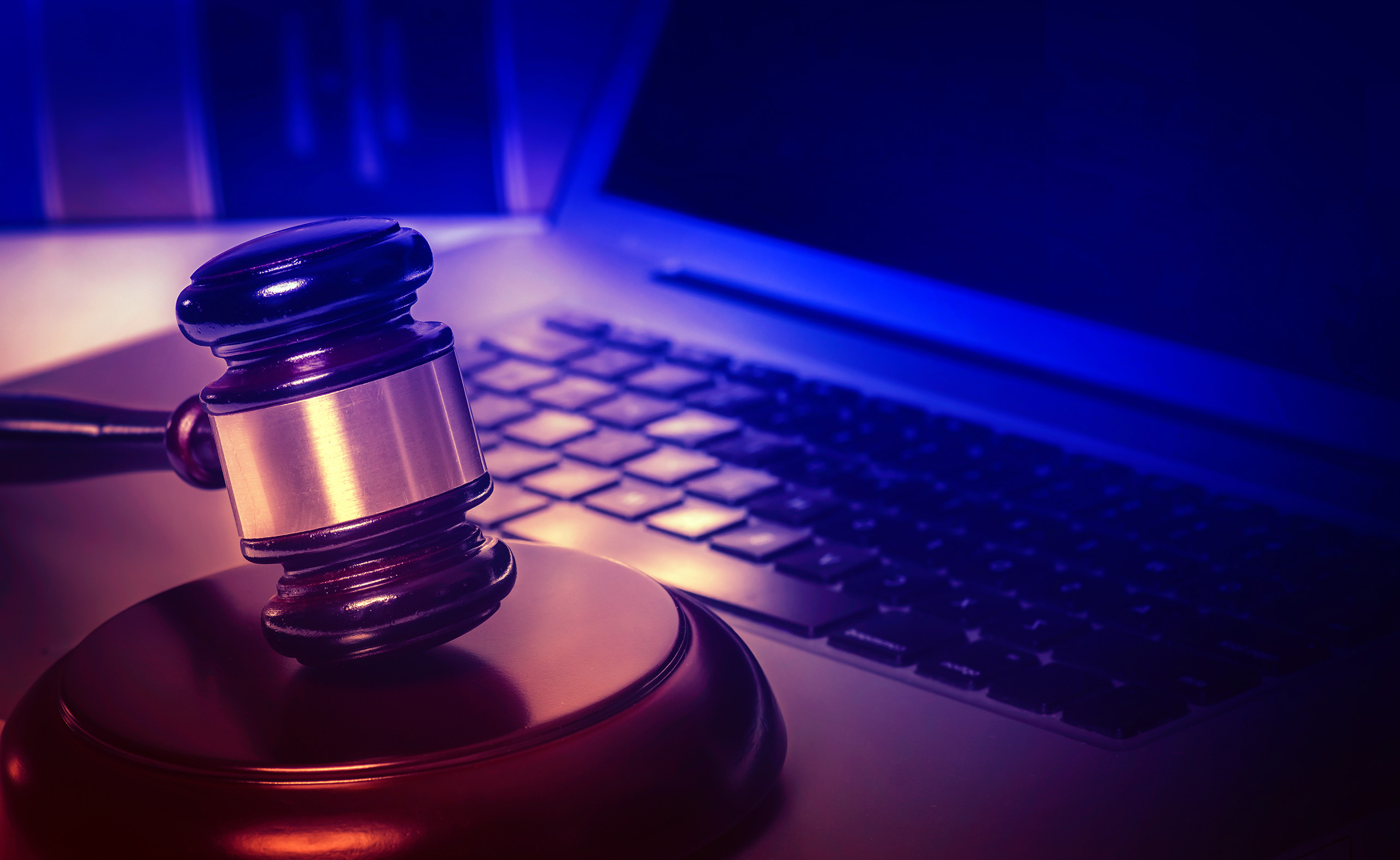 Legal law concept image, gavel on computer